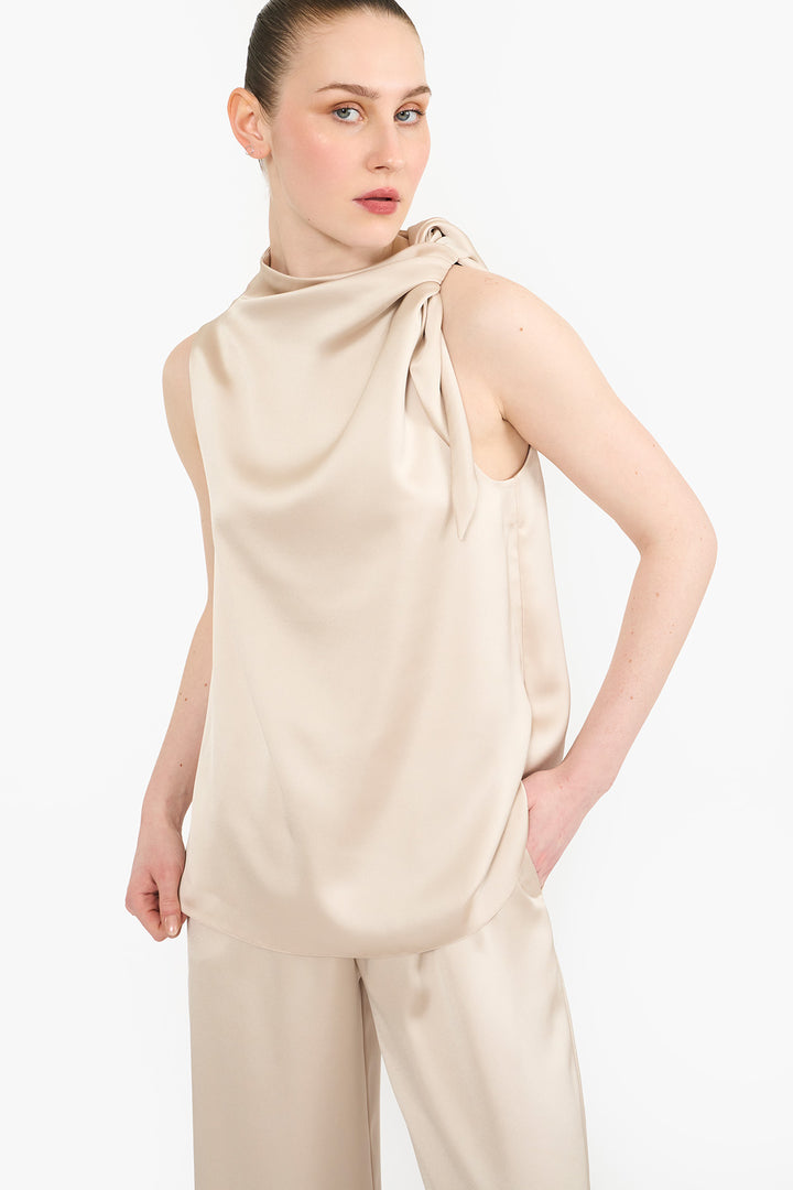 Knotted shoulder halter top