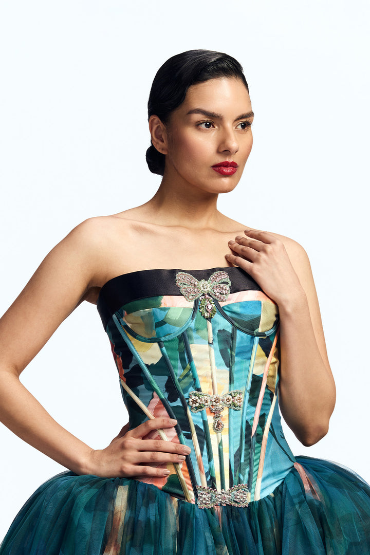 PANELED CORSETED DRESS WITH CRYSTAL BOW