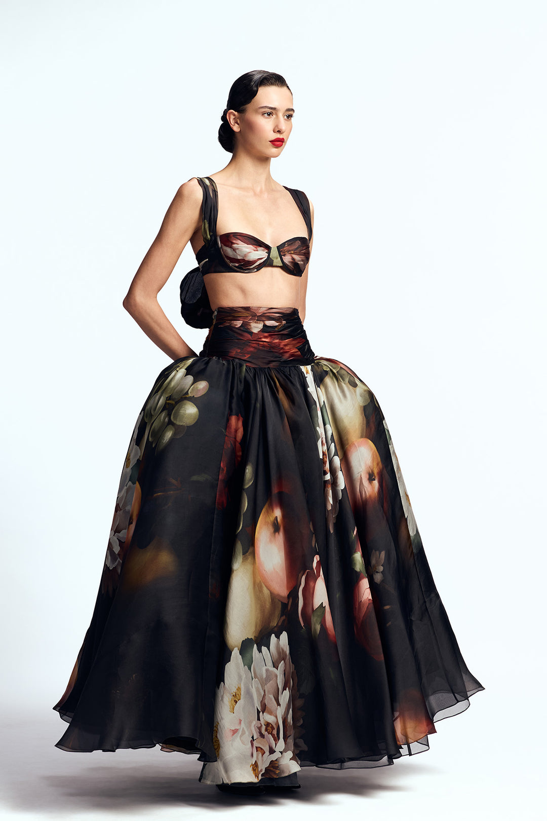 DRAPED BUSTIER PAIRED WITH DROPPED WAISTED SKIRT