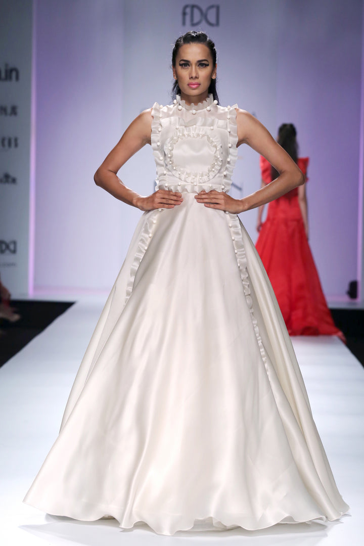 Voluminous gown with frill and pearl texturing and detailing