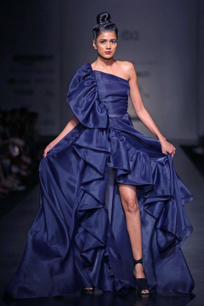 One shoulder string gown with ruffled high slit