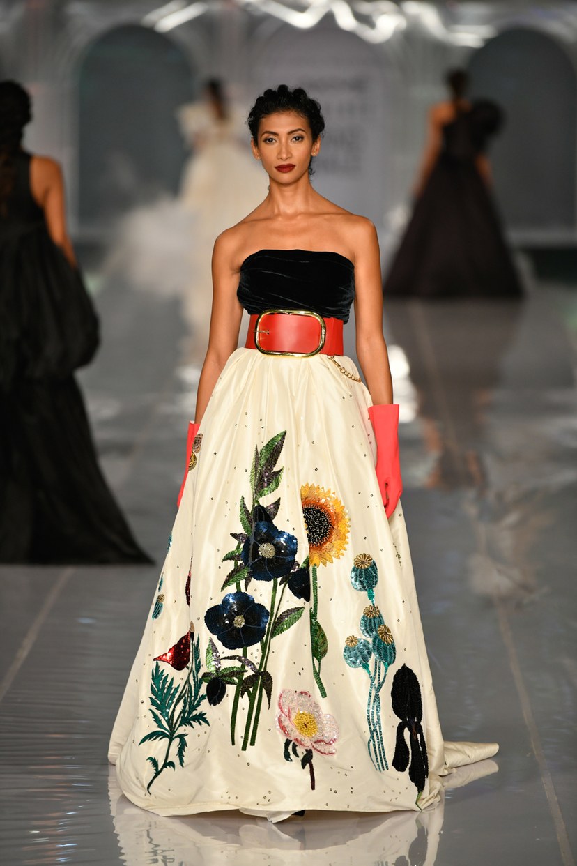 Strapless corsetted flared gown with botanical embroidery