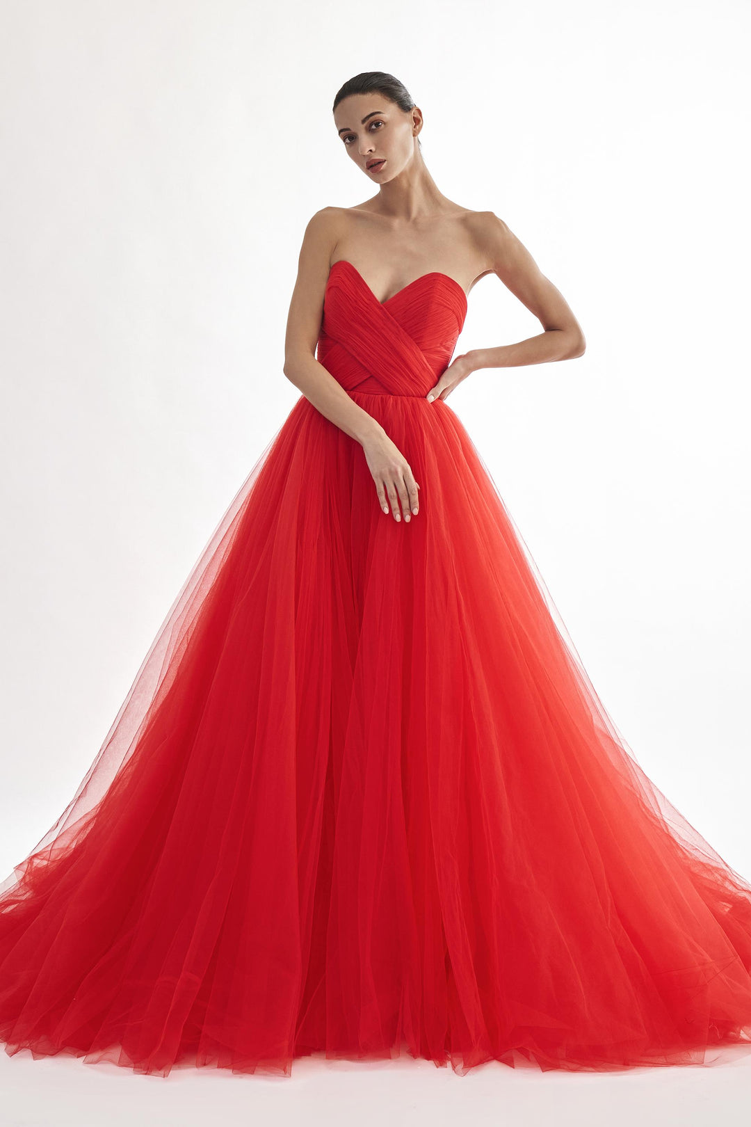 Strapless sweetheart fluted draped net gown
