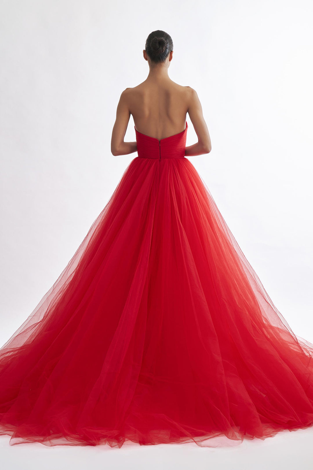 Strapless sweetheart fluted draped net gown