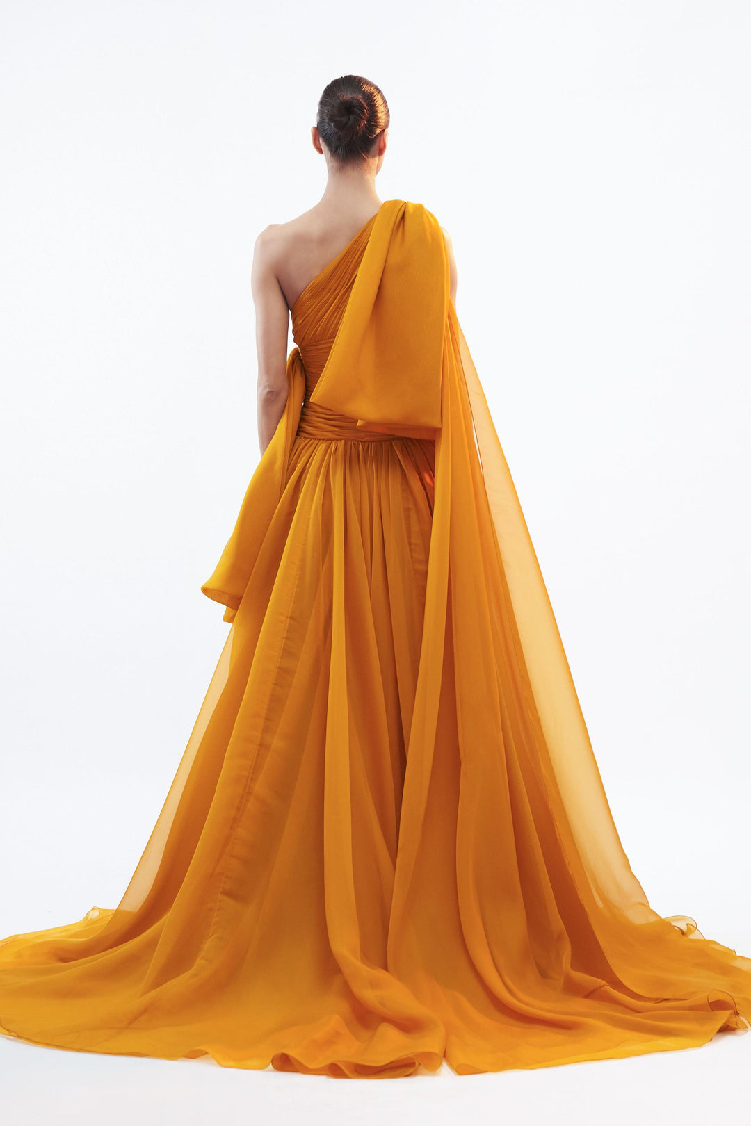 One shoulder drop waisted draped gown with side bow and train